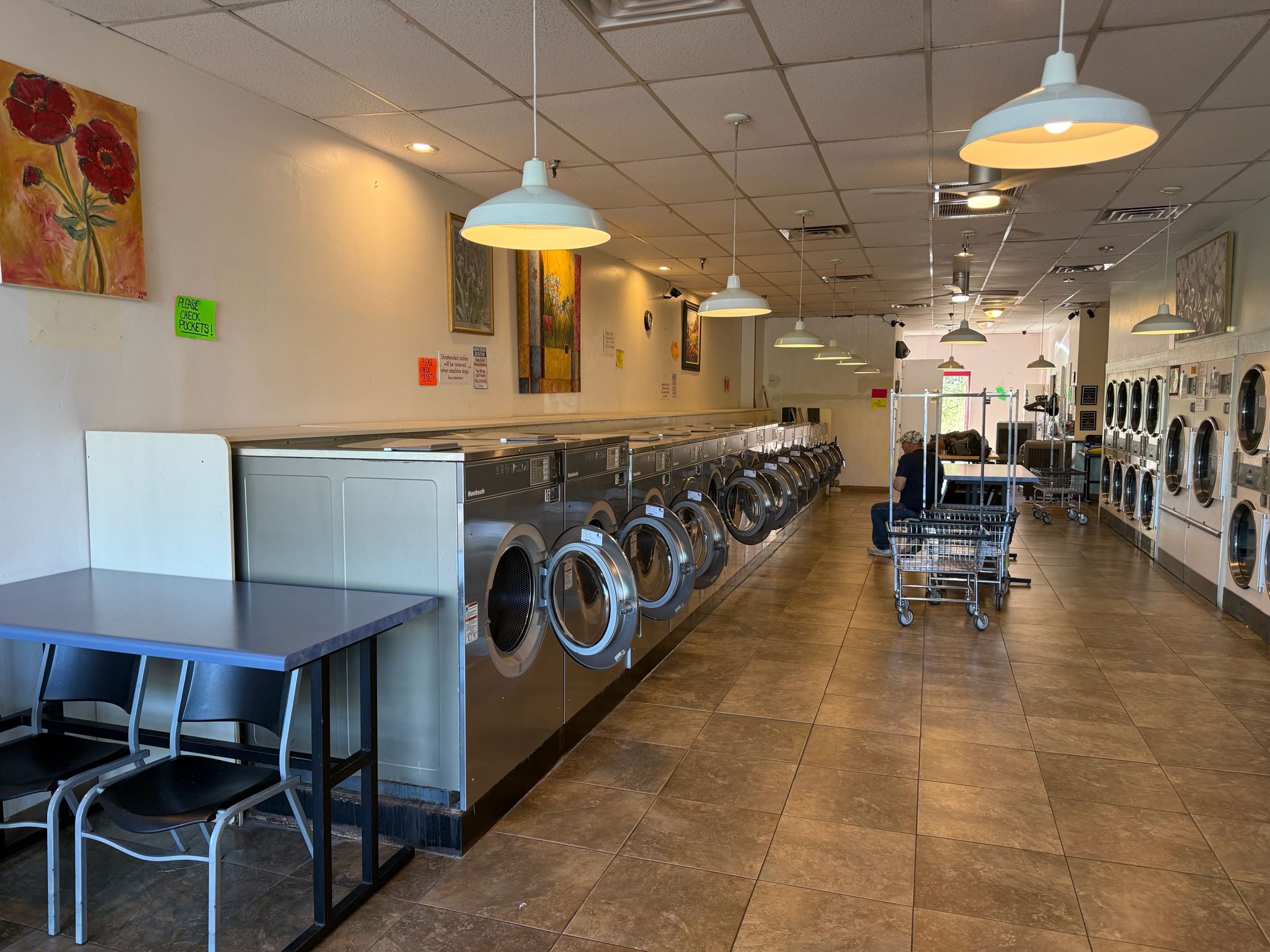 An image of mamws laundry where the washing machines are